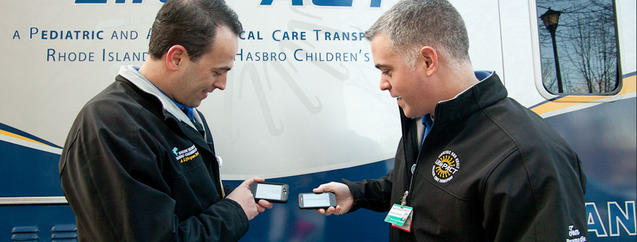 Two Men Viewing The Schedule on Mobile Phones