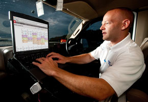 Man using Aladtec in vehicle