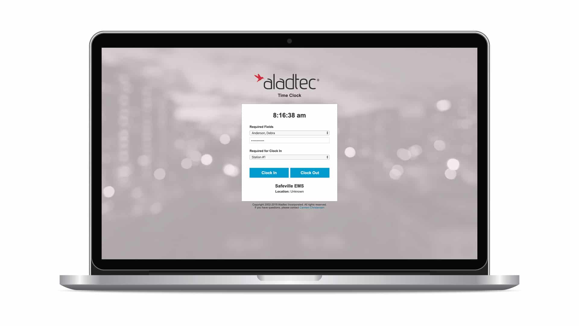 Aladtec time clock on a laptop