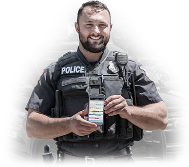 Law Enforcement officer using Aladtec software on a mobile device